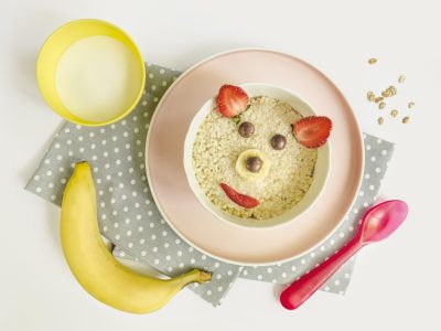 flat-lay-bear-shape-cereals-glass-milk